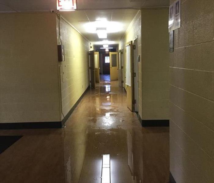 a hallway flooded after a storm