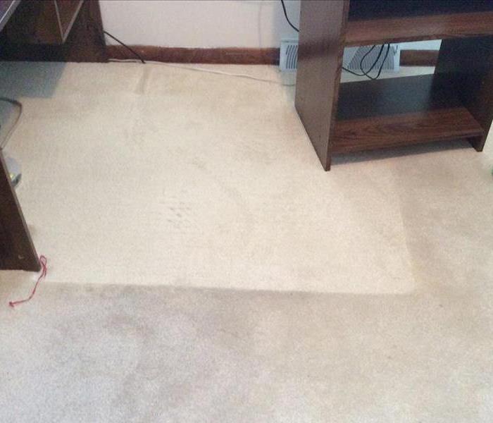 Soot damage on a carpet. 