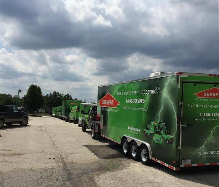 Green SERVPRO Vehicles about to perform water and fire cleanup and restoration in Barberton or Norton area. 
